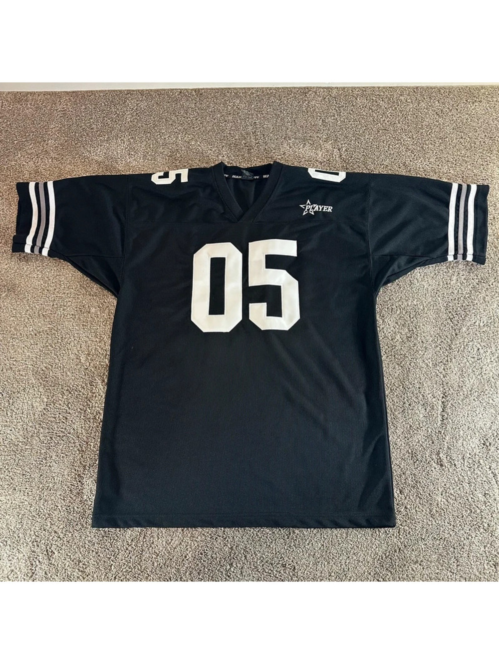 a black Yutu Wasso sports jersey in a size XL player 05